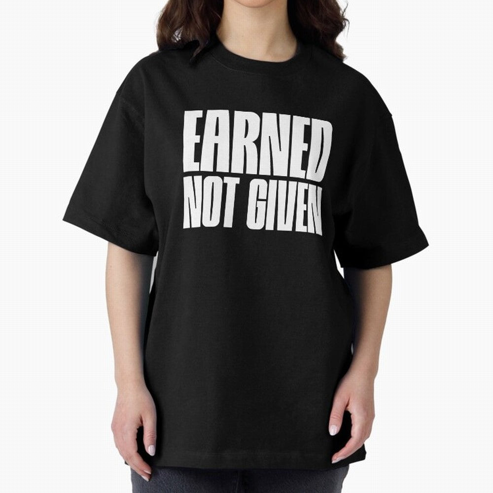 Earned not given white Oversized T-Shirt Celebrate Football Dreams Across Global Football Passion for FIFA World Cup 2026 Group Stage, Driven by Messi, Neymar and Mbappe, Brazil, Portugal and Argentina, Goal Celebration Energy, Supporter Heritage,